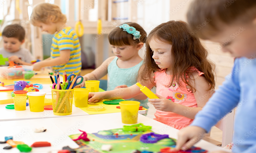 Kids doing arts and crafts at NurtureNest